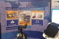 Ultrasonic rail testing trolley and advertising of other OKOndt GROUP's NDT products at the company's booth — ASNT-2019, November, Las Vegas