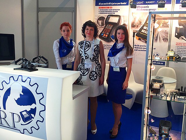 OKOndt GROUP representatives at the company's booth