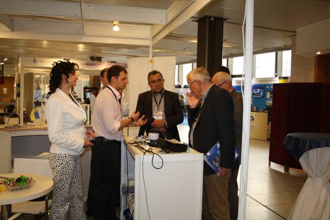 Demonstration of a brand-new portable equipment made by OKOndt GROUP to the  ECNDT-2014 attendees 