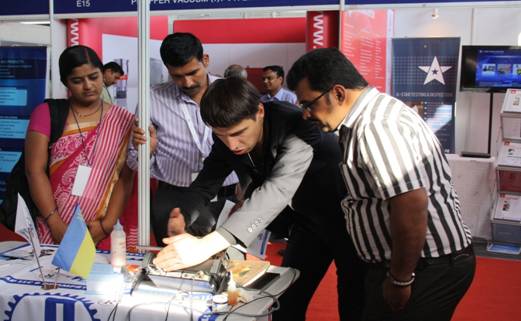 Visitors of National Seminar&Exhibition on nondestructive evaluation (NDE-2014) are looking at OKOndt GROUP's device operation