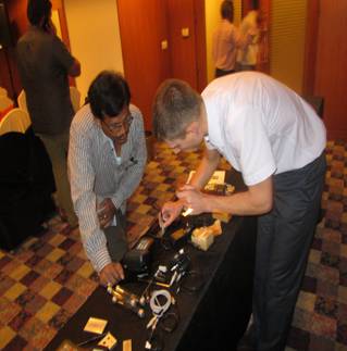 Demonstration of  eddy current equipment to an Indian colleague during the National Seminar &Exhibition on nondestructive evaluation (NDE-2014)