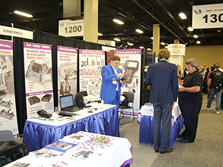 Showcasing tables with the NDT equipment produced by OKOndt GROUP at the ASNT Annual Conference 2017