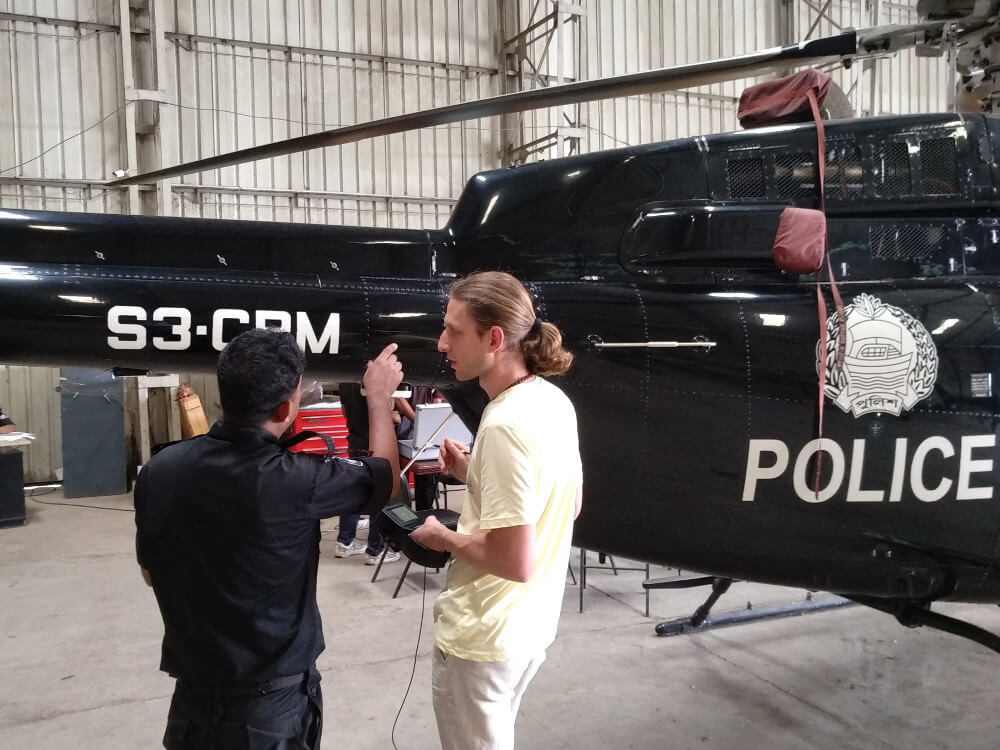 Training on how to work with the portable eddy current flaw detector Eddycon C in practice — testing the helicopter skin