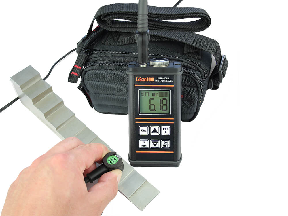 Portable ultrasonic thickness gauge ExScan1000, transducer, calibration block and its storage bag